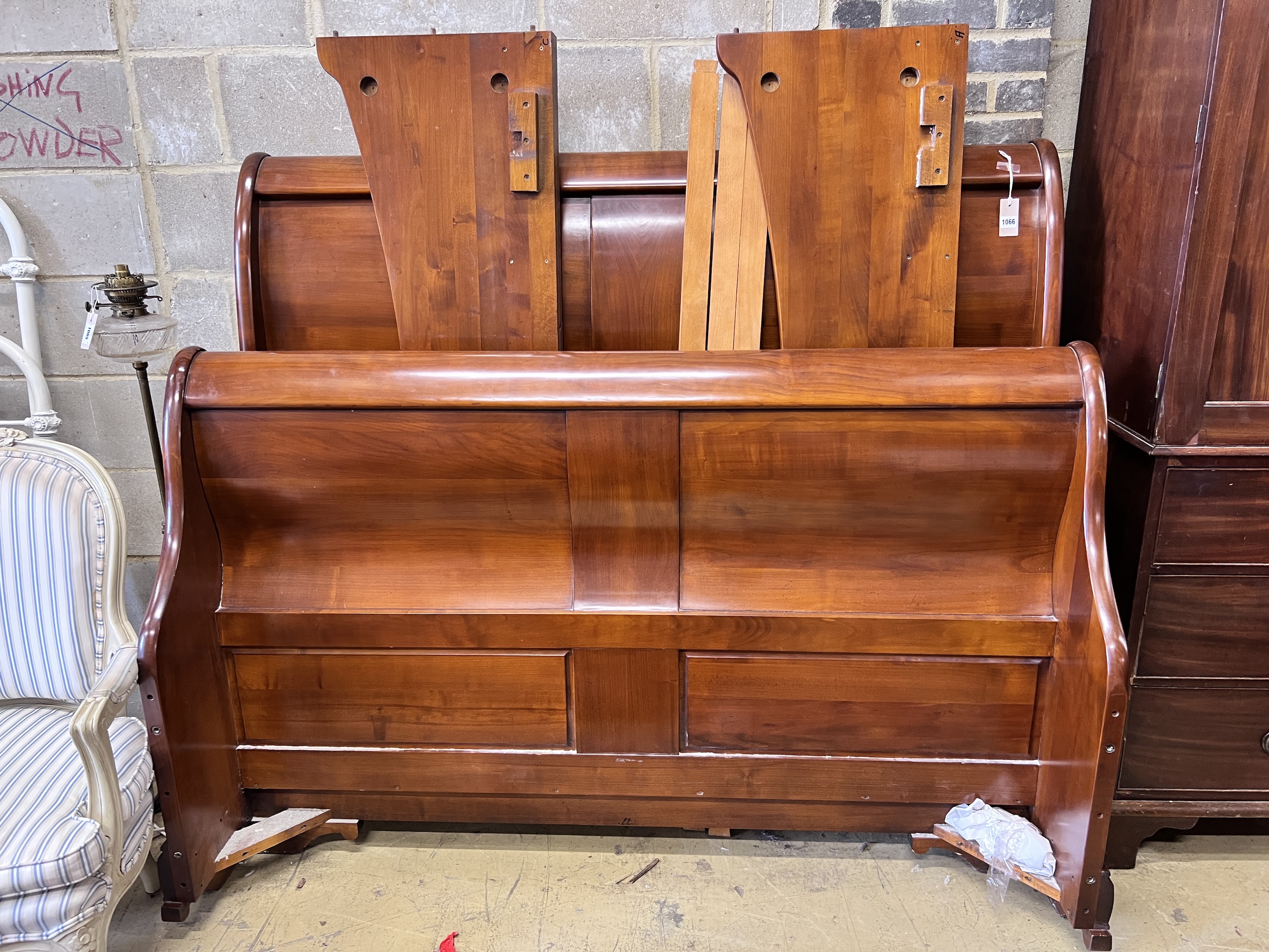 A modern cherrywood double sleigh bed, width 164cm